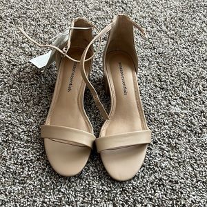 Nude heels. Amazon basics. Size 7W. Fits more like an 8. Never worn